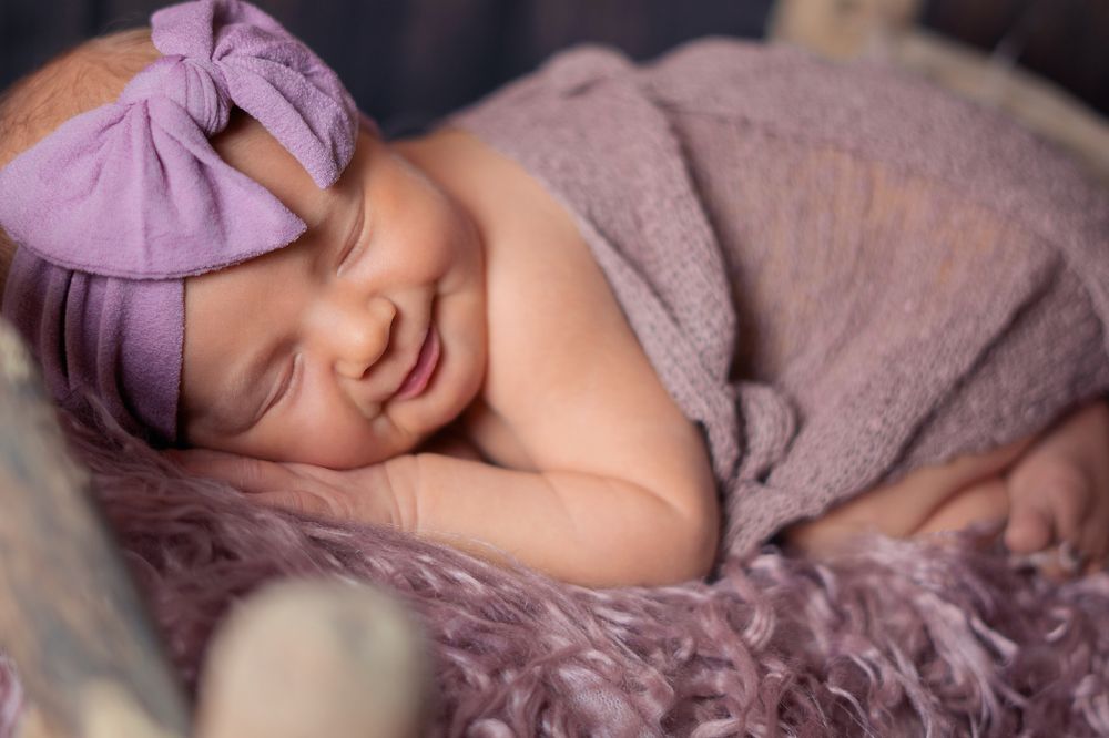 Улыбка младенца