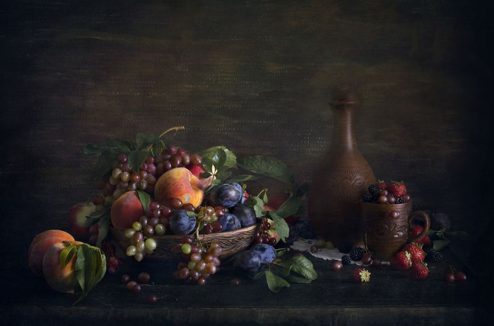 Still life with peaches and strawberries