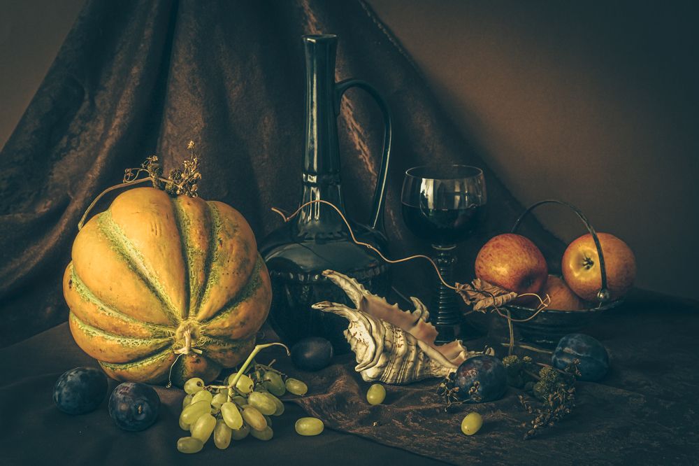 Still life with melon, grapes and shell.