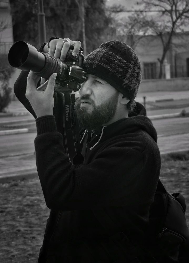 bearded photographer