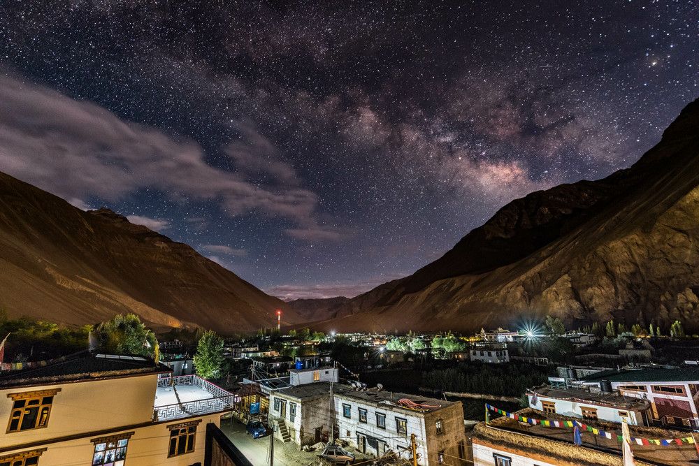 Village under galaxy