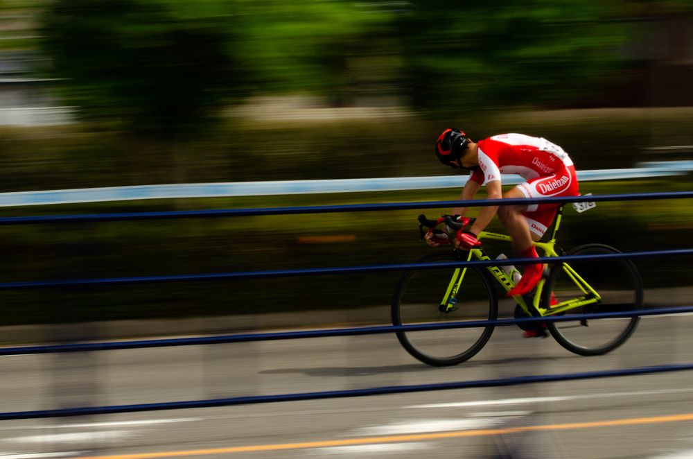A cyclist watches the other participants on his bike