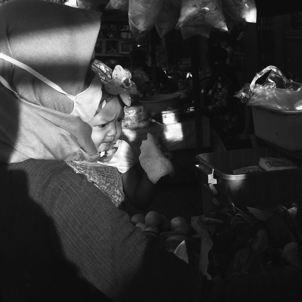 “A mother holding her child”