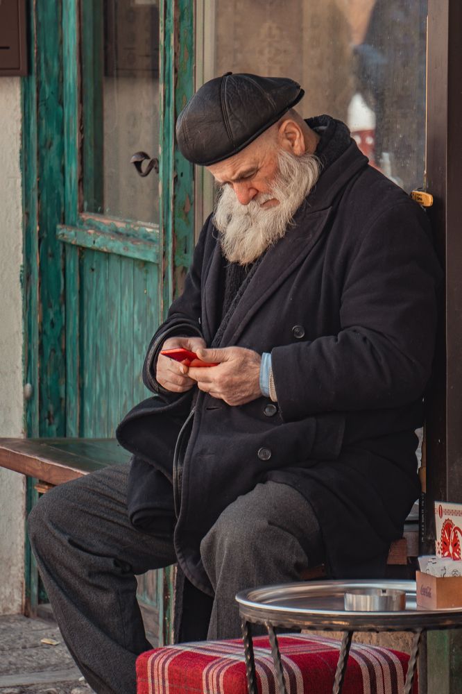 Old man with white beard in the street of Sarajevo