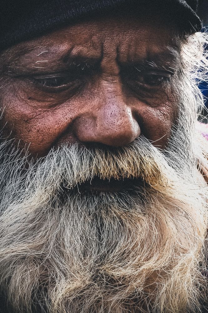Man with beard like Great philosopher osho