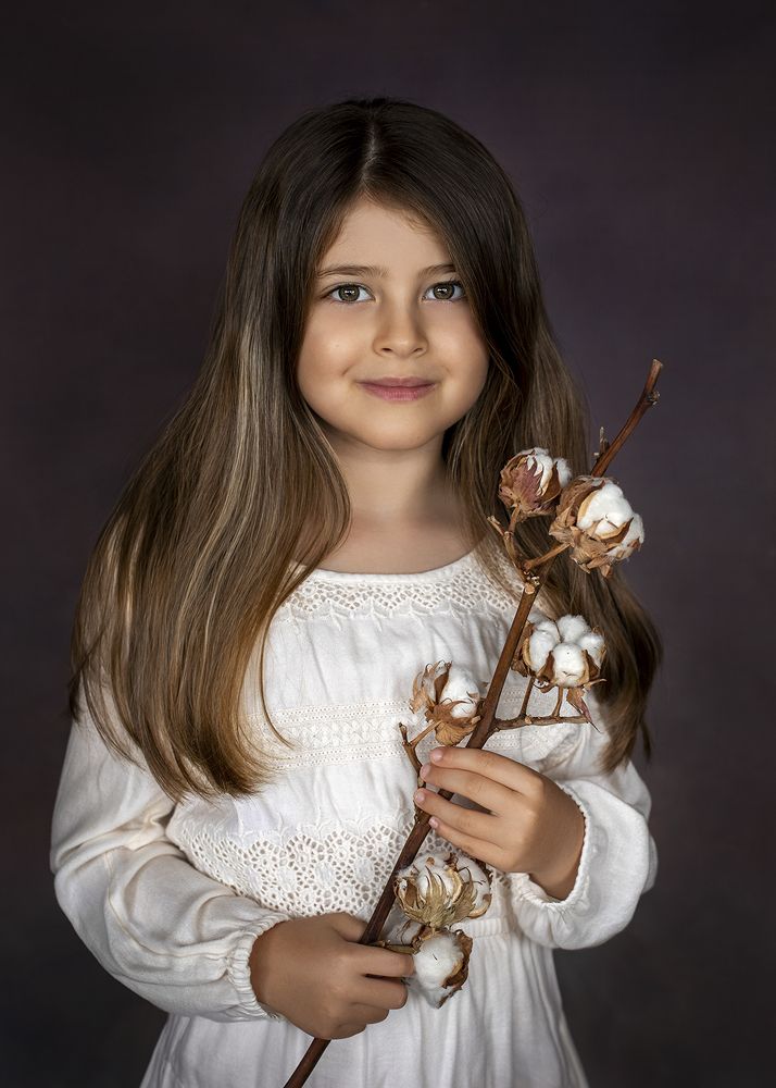 Girl with cotton flower