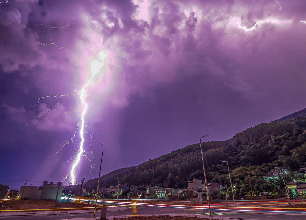 lightning in the street in front of the home