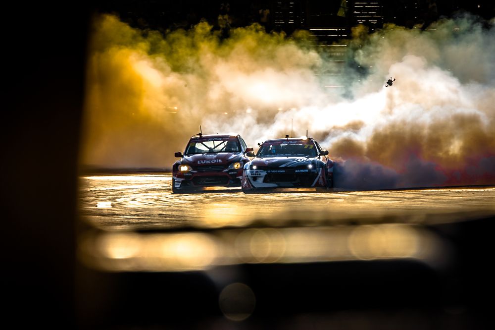 Men shut their doors against a setting sun