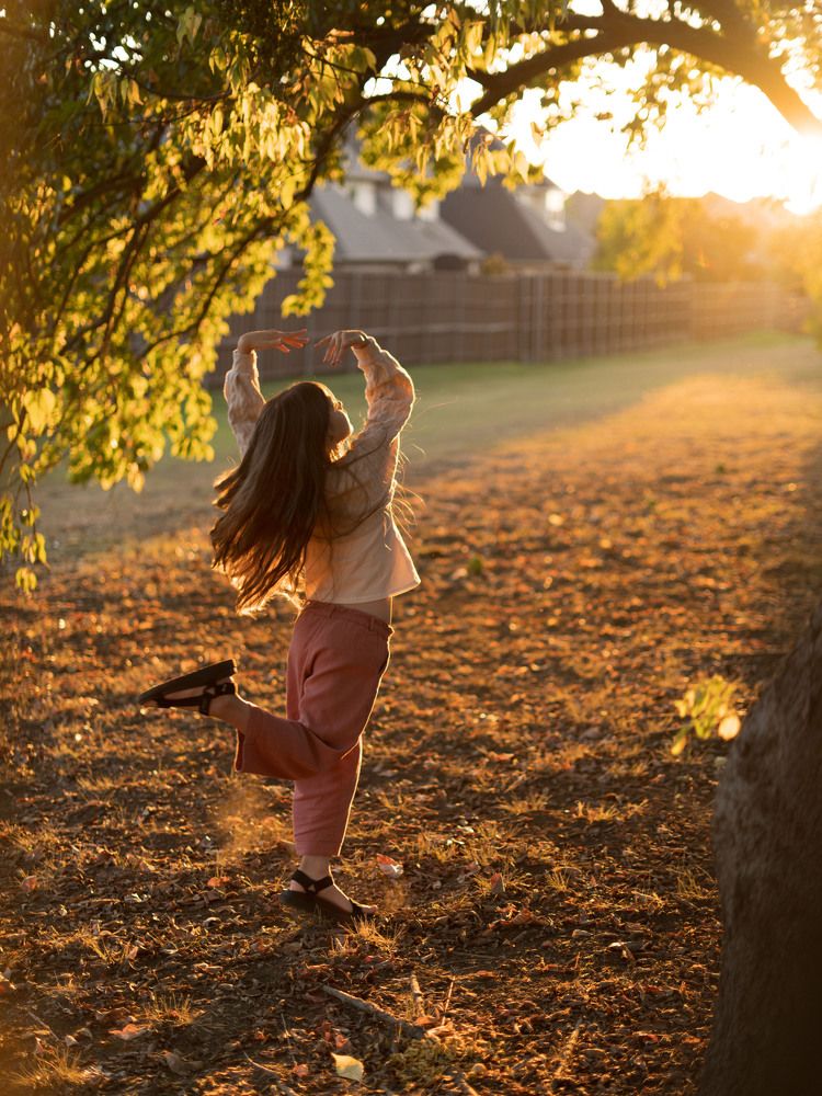 Rays of the sun in dancing hair.