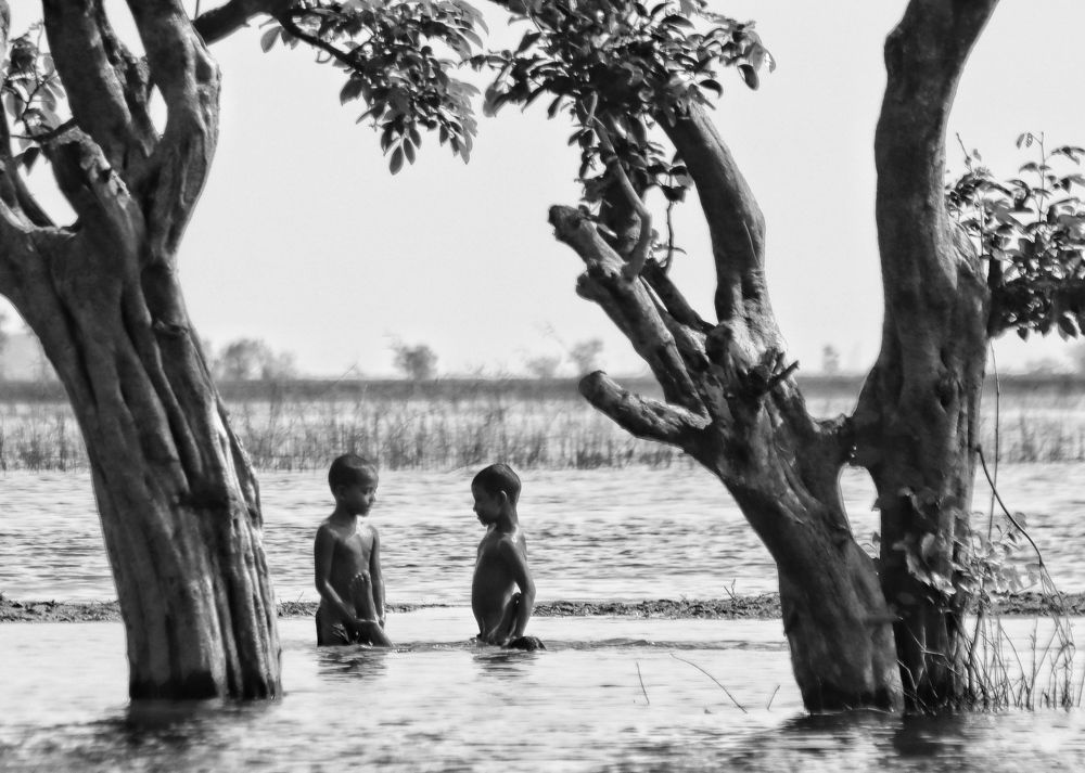 Rural Boys having fun in water