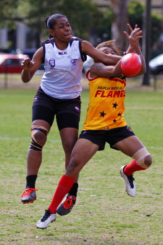 Fiji Vonu (White) vs PNG women (yellow)