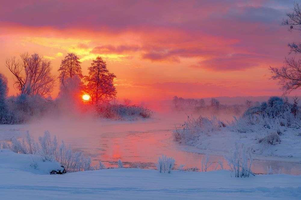 Frosty winter sunrise over the river