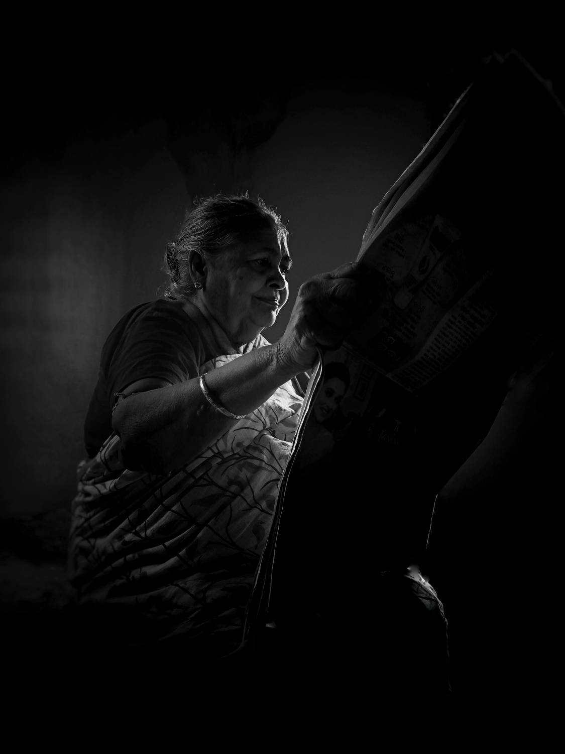 Morning newspaper and granny