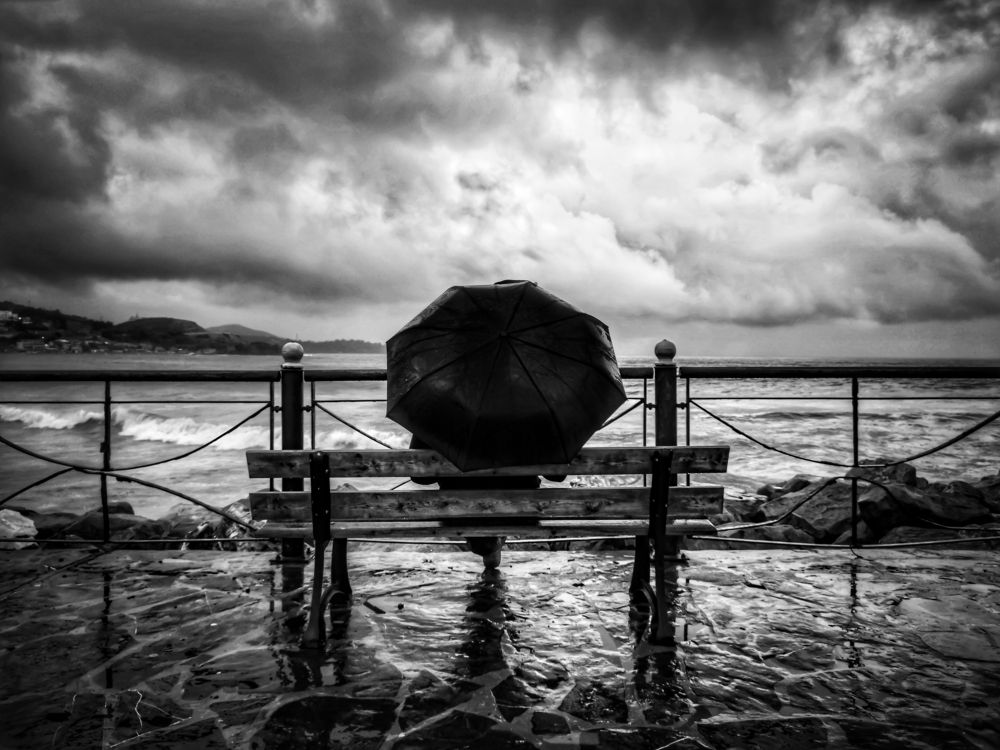 Waiting under my umbrella