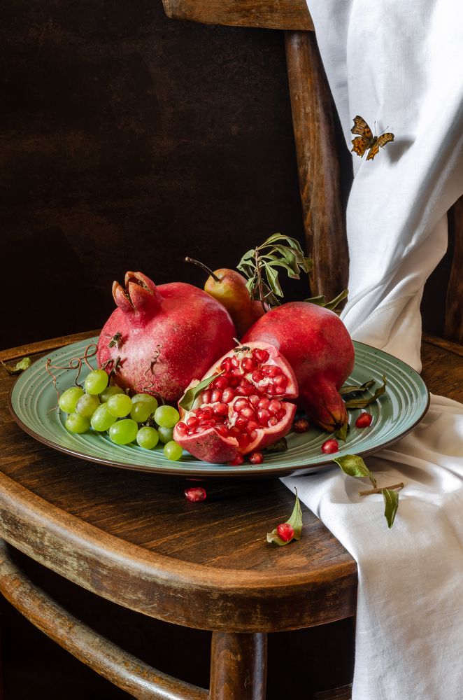 Still Life with pomegranate, grape and bees