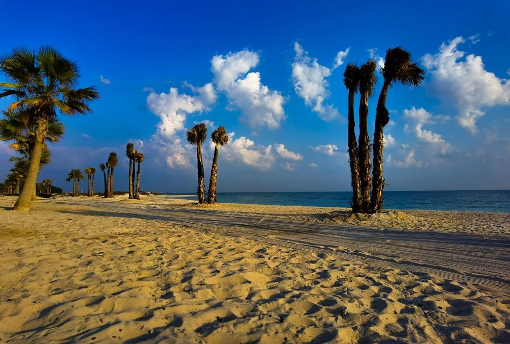 Clouds with sea and sand
