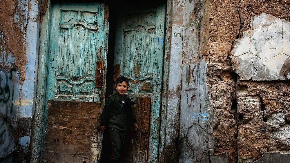 A child with an old house