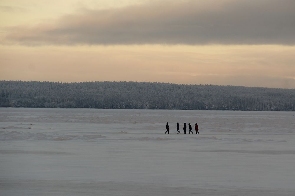 Five on an icy lake.