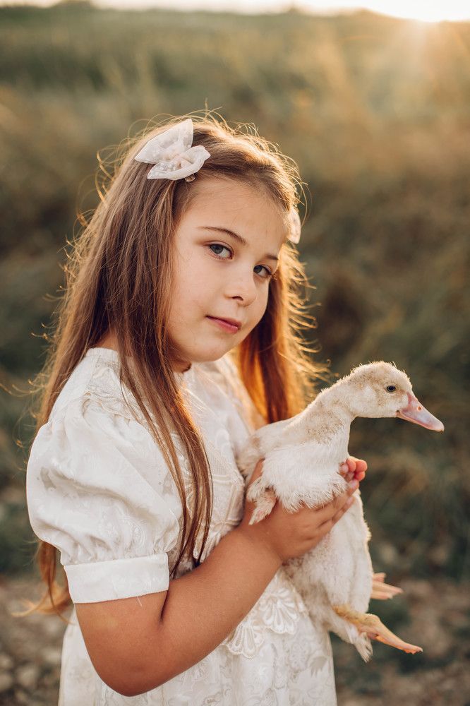 Малышка и утенок