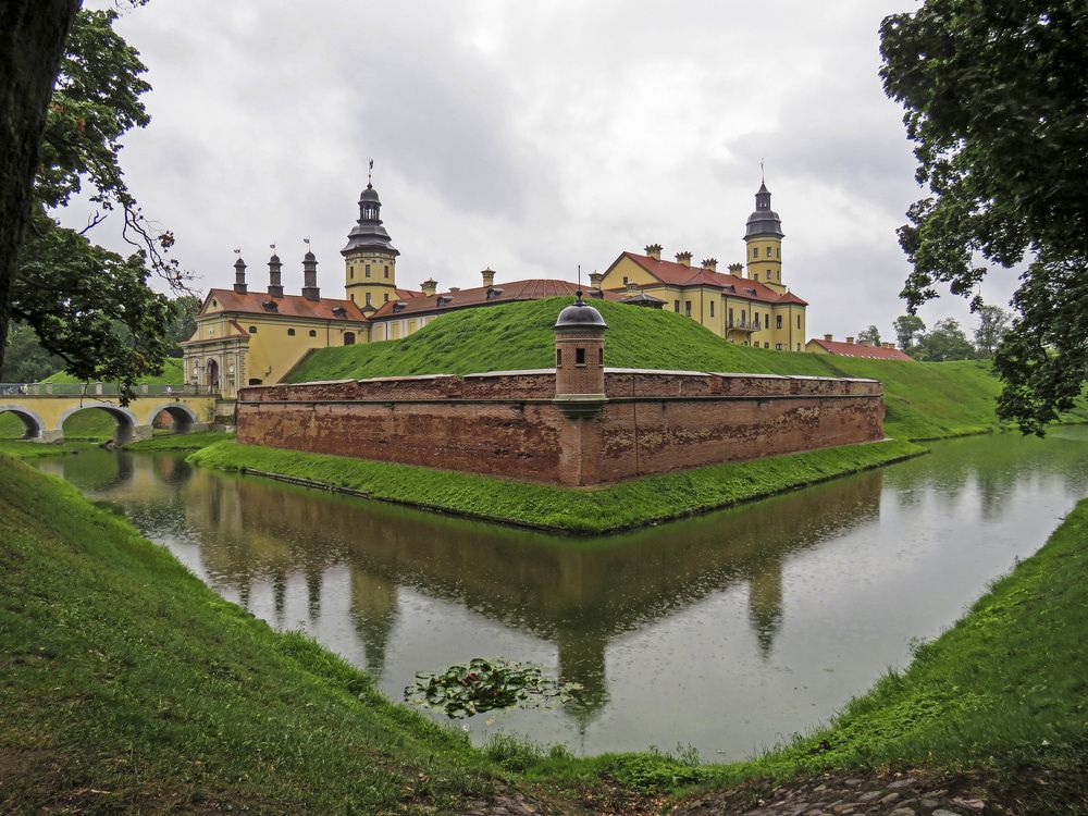 Nesvizh castle is reflected in the pond