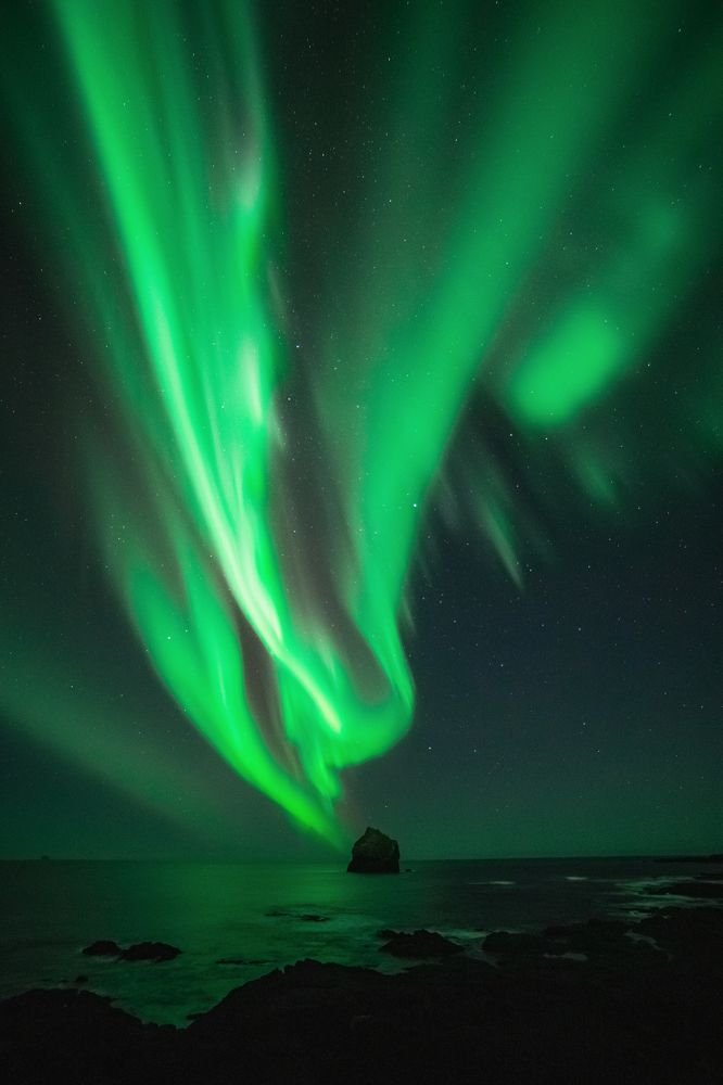 Northern lights explosion in the sky during winter night