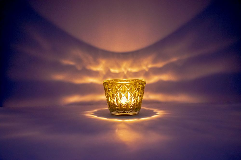 candle light in a glass