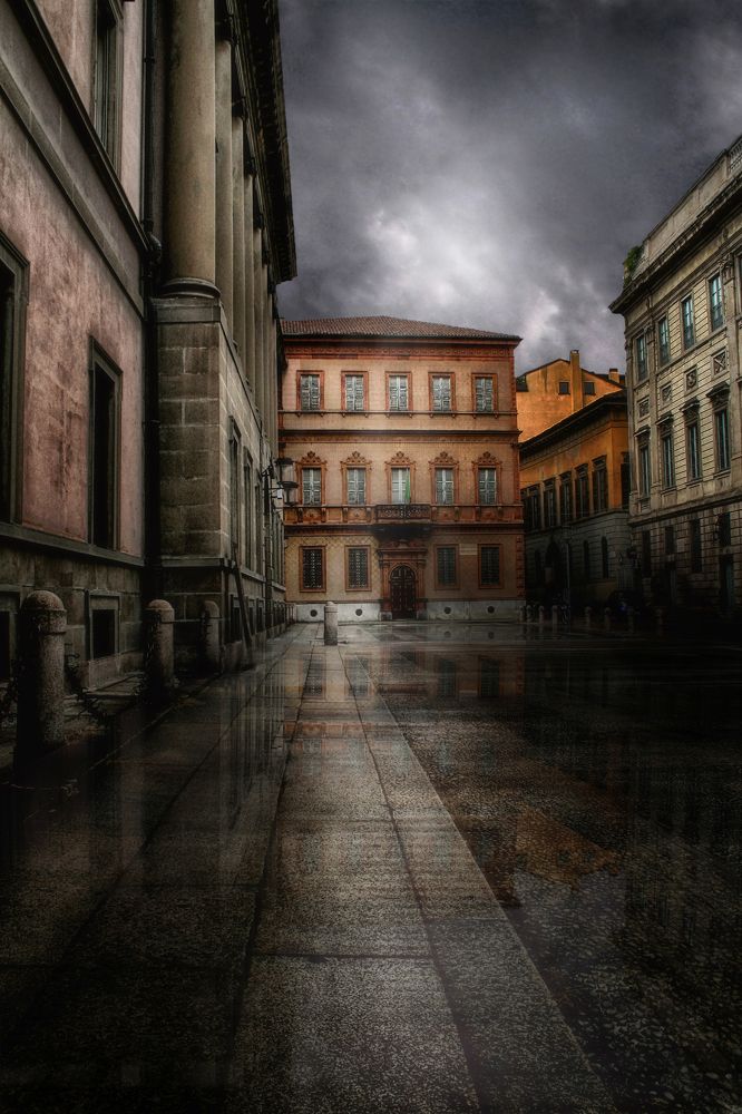 Milan reflected in the rainwater