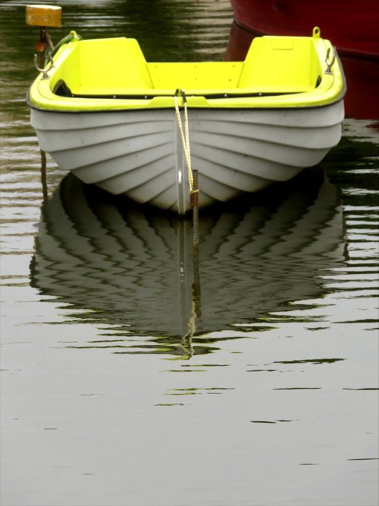 Yellow boat reflection