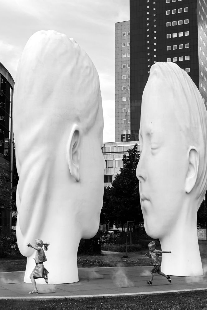 Two heads of children dreaming.