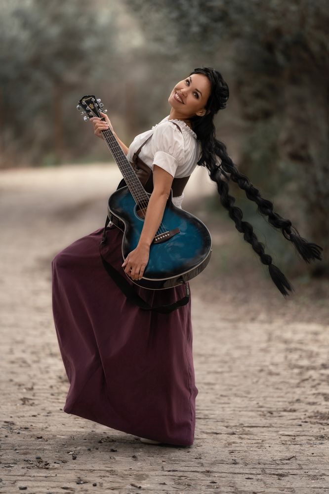 Девушка-бард