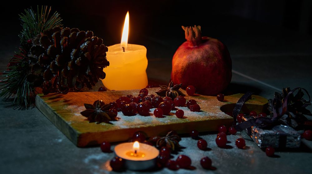 winter christmas still life by candlelight