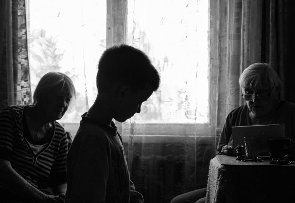 Two grandmothers and one grandson