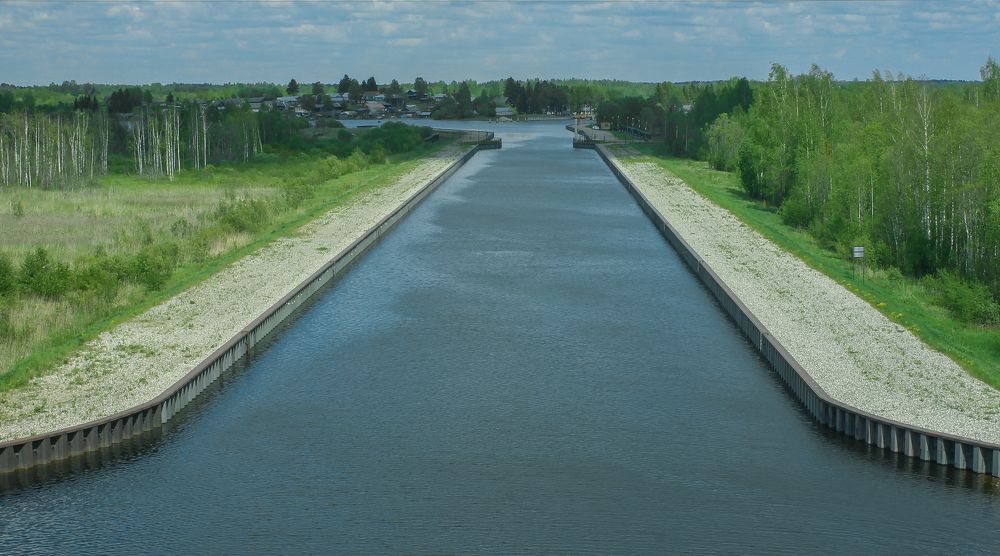 Kishemsky canal of the North-Dvinsky water system in Kirillovsky district on a summer day