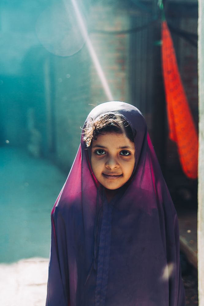 A Muslim child is going to school.