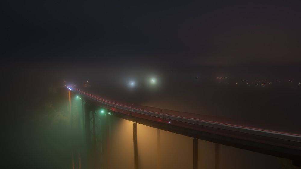 The fog covers the bridge