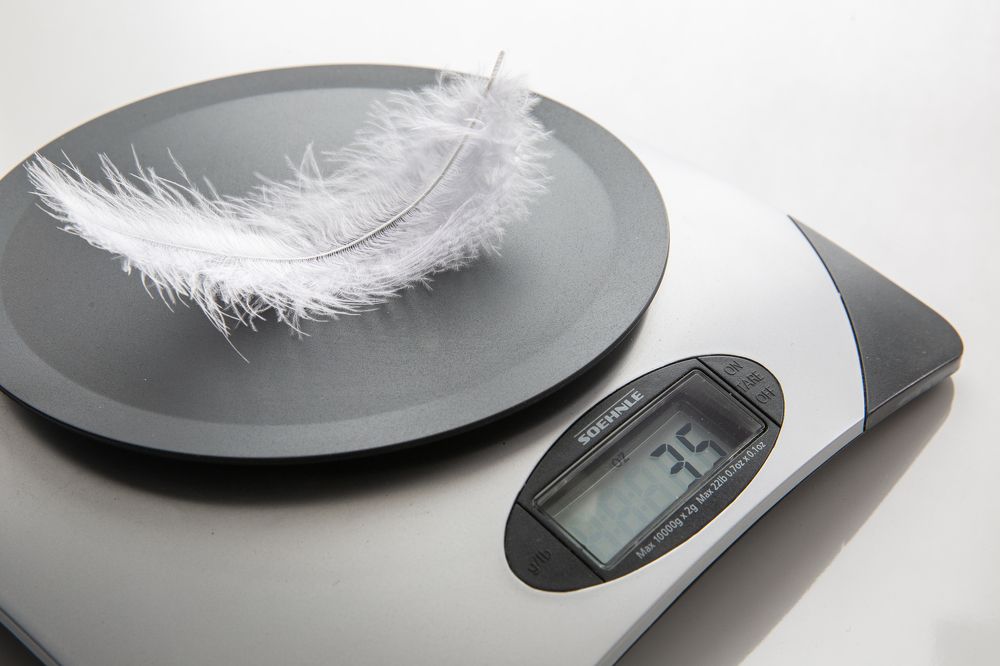 Перо весом 35 унций