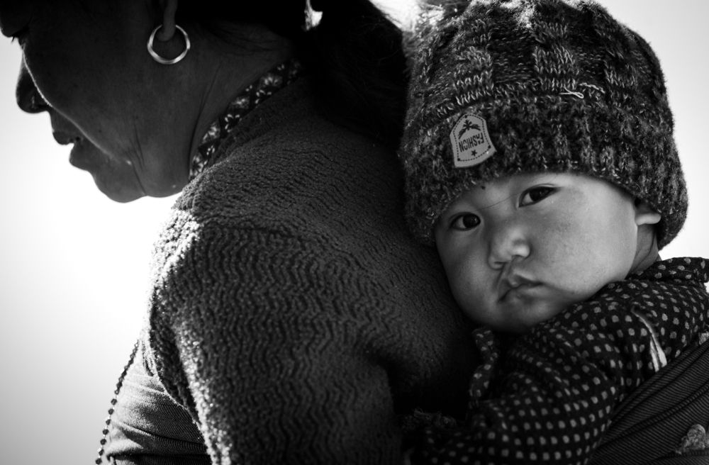 life in village: the women with her grandson