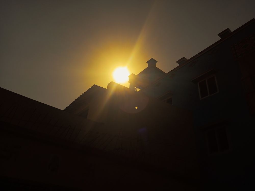 Sun between the two houses