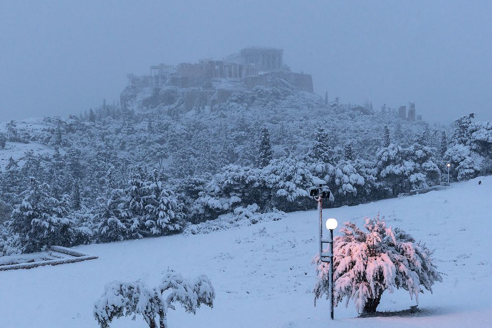 Philopappou hill and Acropolis rock under heavy snow