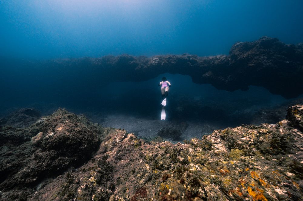 Explore Ly Son underwater stone arch