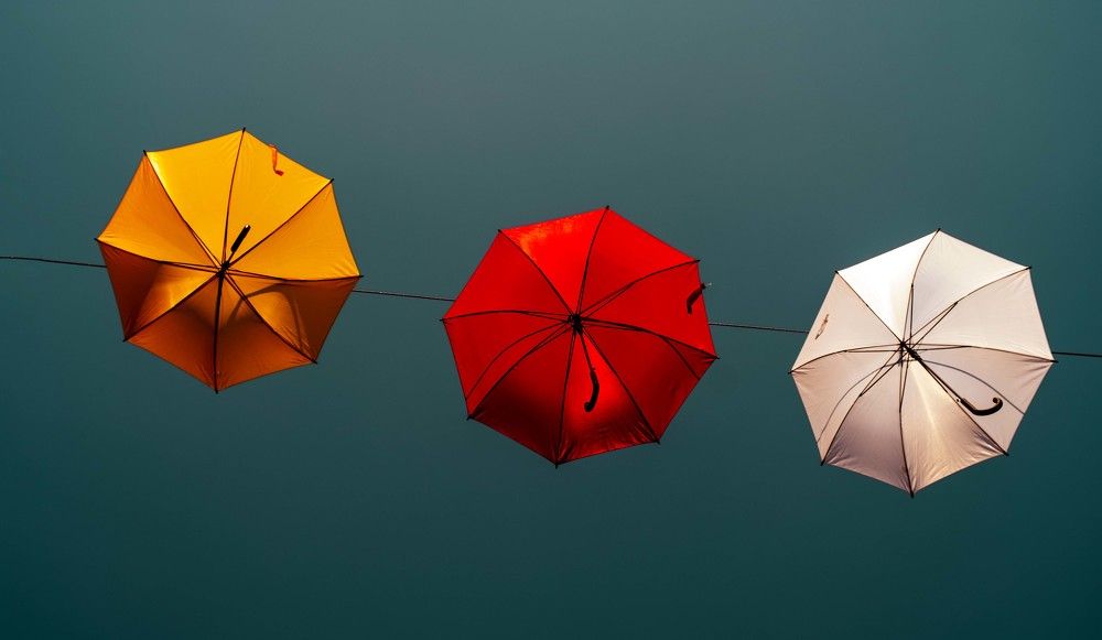 Three Flying Umbrellas