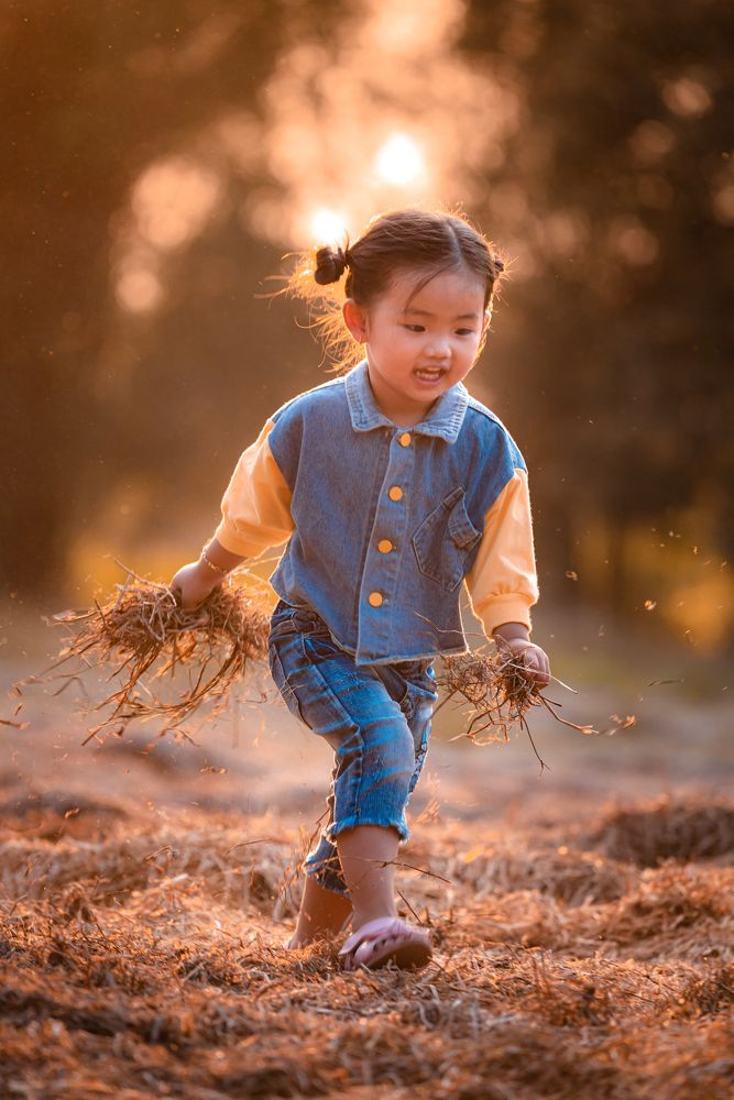little girl playing with her mother