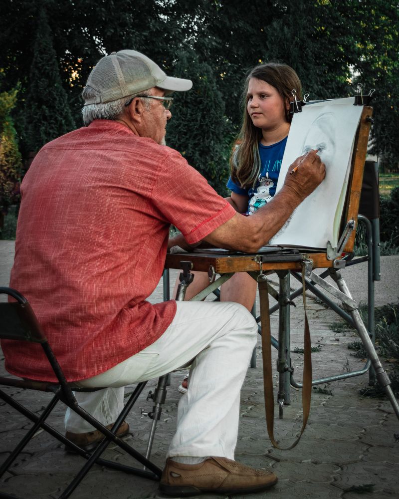 Уличный портретист