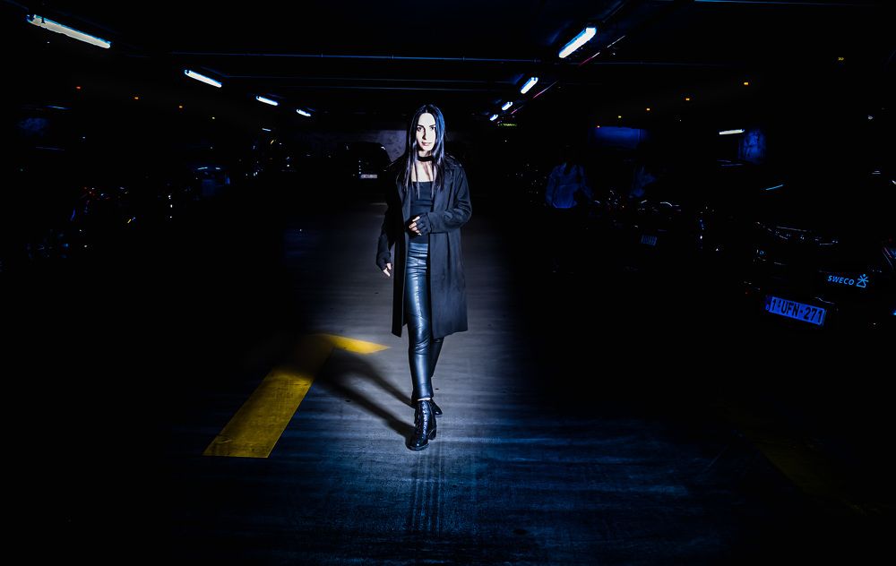 the lady with black hair and a style