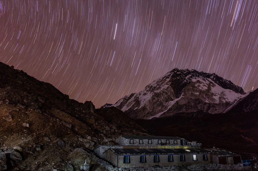 The star is shining above the mountain