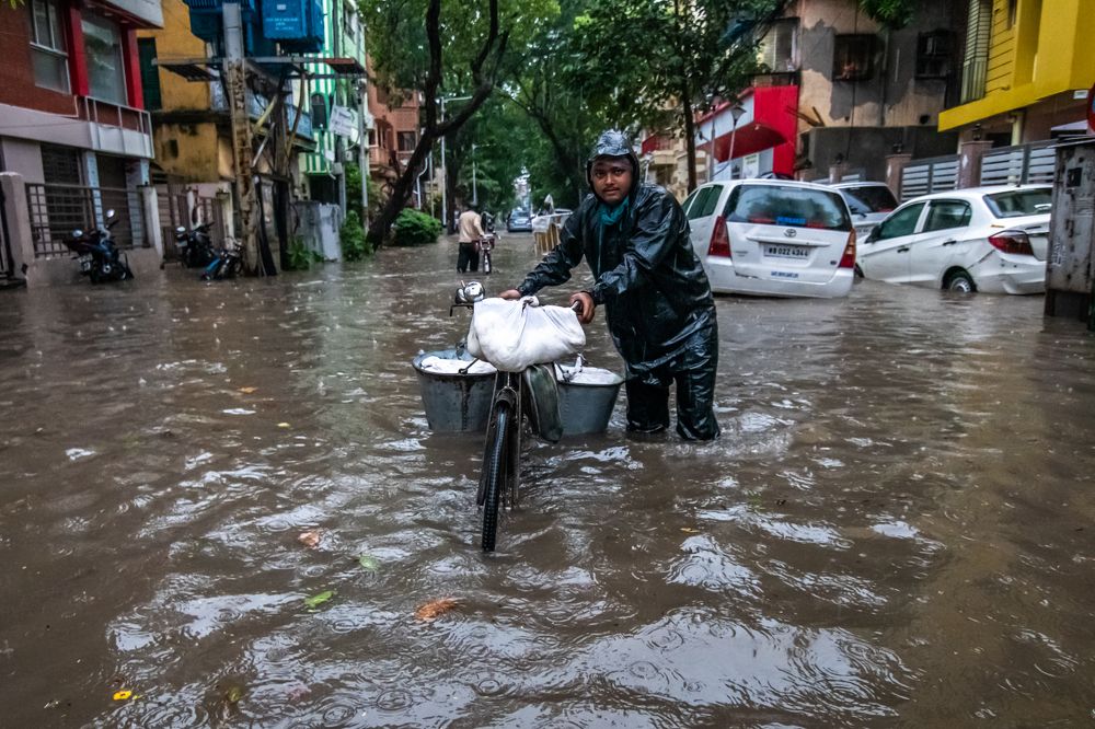 Paneer Man Through Flooded Road