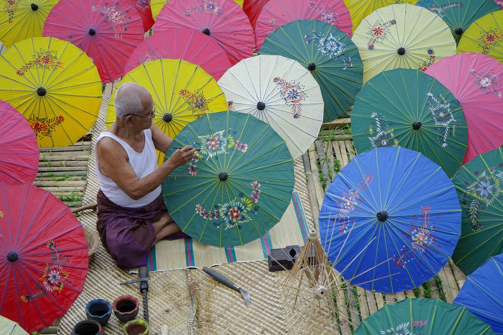 the traditional umbrella painter