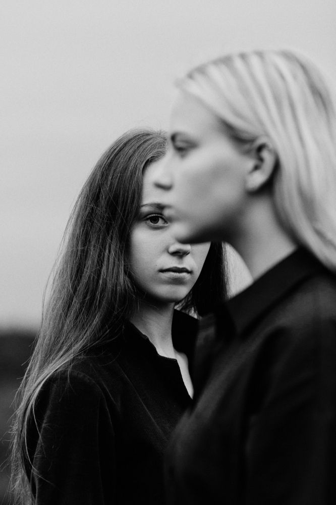 A sister is both your mirrow and your opposite