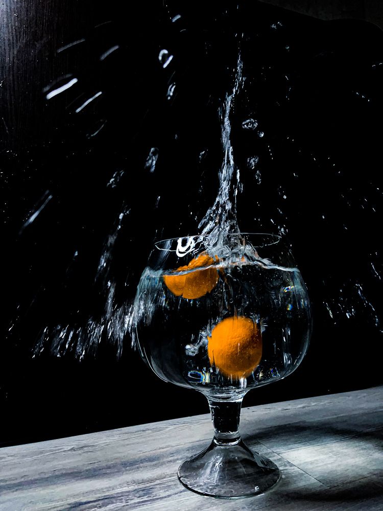 splashing water from a large glass