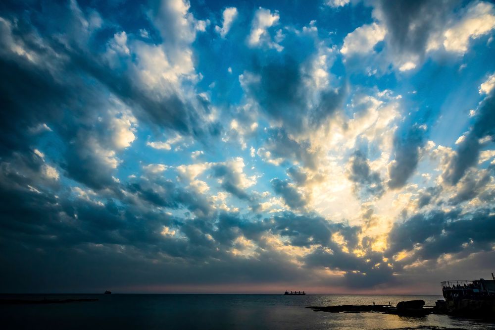 dramatic cloud sky at the Mediterranean sea during sunset